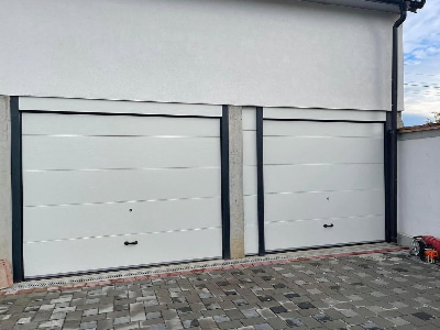 Prodhim dhe montim i dy portave automatike tavanore Prodhim dhe montim i dy portave automatike tavanore